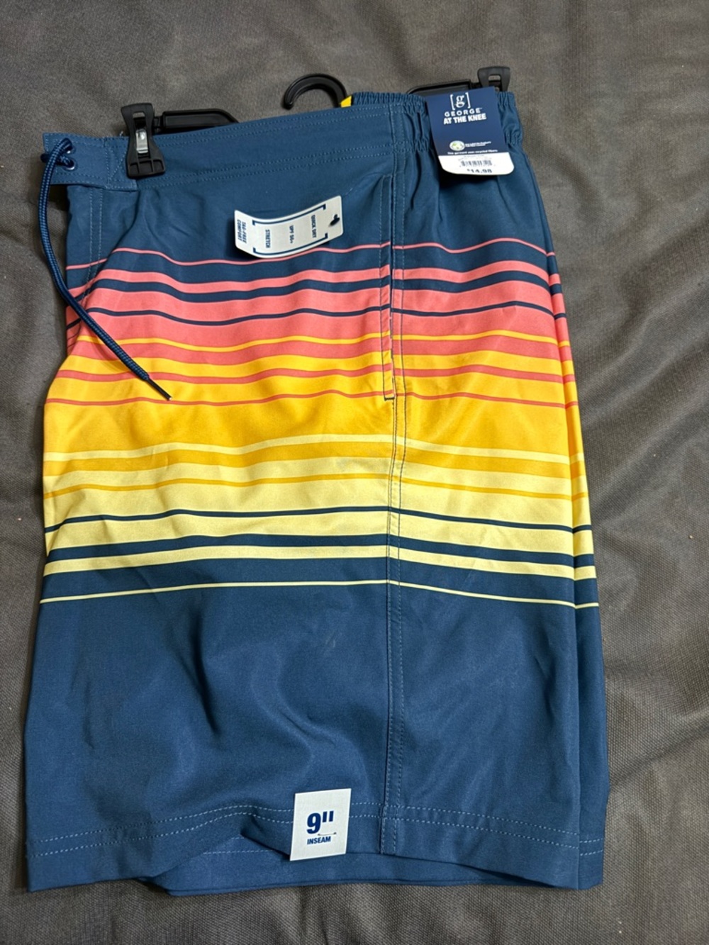 George Men's Navy Swim Trunks with Coral and Yellow Gradient Stripes